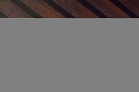 BMI - Weight and Height write on a book isolated on Wooden Table.の写真素材