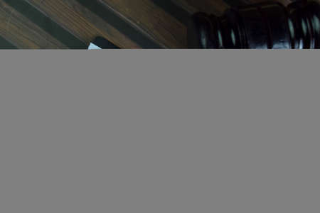 Arbitration Agreement write on a paperwork isolated on Wooden Table.の写真素材