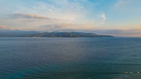Aerial view of Gili Trawangan Island, Indonesia with morning sunrise sunlight. Lombok, Indonesia,