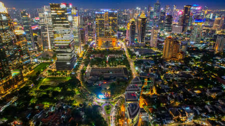Aerial view of Architecture details Modern Building Glass facade Business background at night. Jakarta, Indonesia, November 9, 2021のeditorial素材