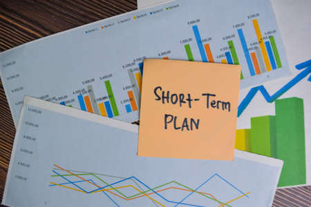 Keogh Plan write on sticky notes isolated on Wooden Table.の写真素材