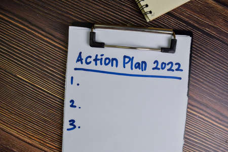 Urgent Care write on sticky notes isolated on Wooden Table.の写真素材