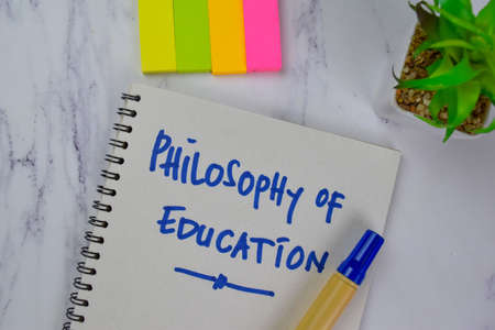 Insider Trading write on sticky notes isolated on Wooden Table.の写真素材