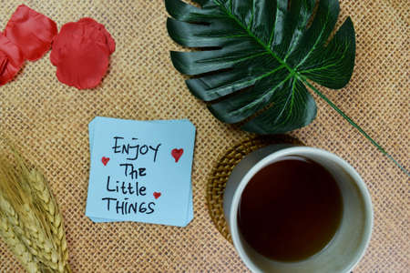 Hocus Pocus I Need A Coffee To Focus write on sticky notes isolated on Wooden Table.の写真素材