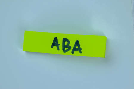 CAPM write on sticky notes isolated on Wooden Table.