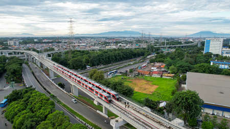 Aerial view of Jakarta LRT train trial run for phase 1 from UKI Cawang. Jakarta, Indonesia, March 8, 2022のeditorial素材