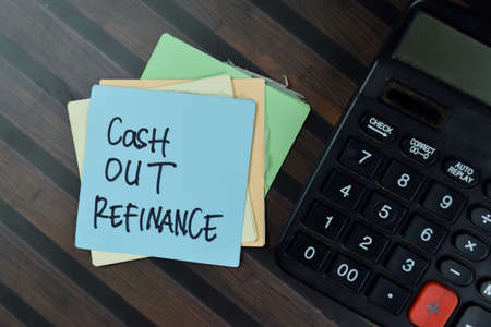 Project Progress Tracking write on a book isolated on Wooden Table.の写真素材