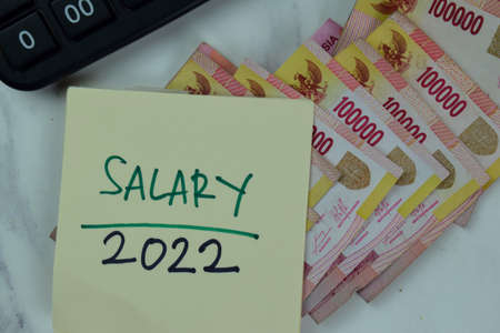 2022 New Personal Positioning write on sticky notes isolated on Wooden Table.