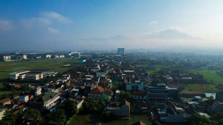 Aerial view of quiet traffic on bandung street with skyscrapers during weekend in bandung city. Bandung, Indonesia, May 6, 2022のeditorial素材