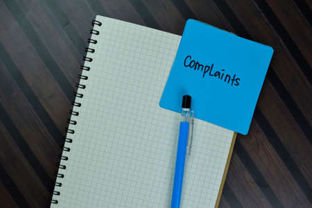 RFP - Request For Proposal write on sticky notes isolated on Wooden Table.の写真素材