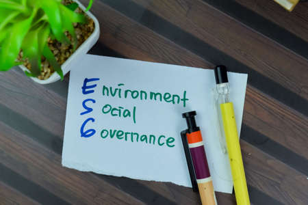 Concept of Working Capital Loan write on sticky notes isolated on Wooden Table.