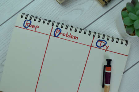 Concept of Are you Eligible? write on sticky notes isolated on Wooden Table.の写真素材