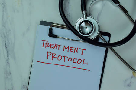 Concept of Small-Cap Stock write on a book isolated on Wooden Table.の写真素材