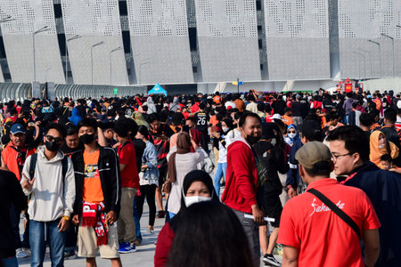 Crowds on Group of fans on the stadium Jakarta International Stadium. Jakarta, Indonesia, August 1, 2022のeditorial素材