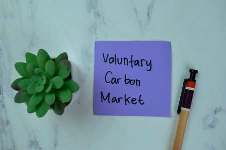 Concept of ROI - Return Of Investment write on sticky notes isolated on Wooden Table.の写真素材