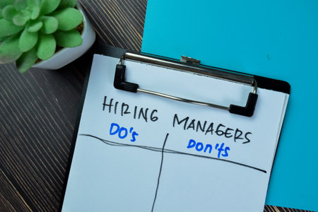Concept of Hiring Managers Do's and Dont'ts write on paperwork isolated on Wooden Table.の写真素材