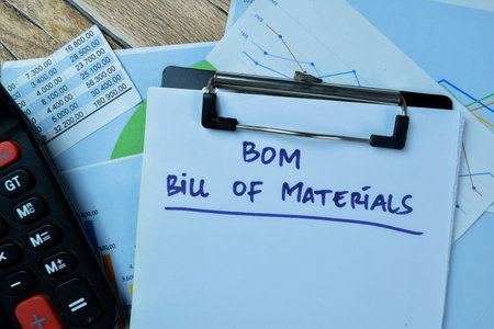 Concept of BOM - Bill of Materials write on paperwork isolated on Wooden Table.の写真素材