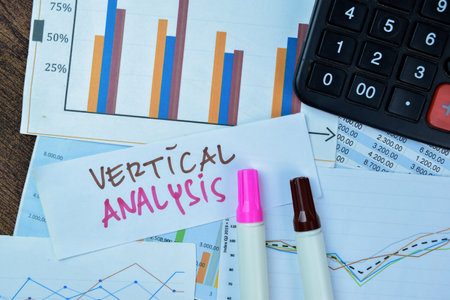 Concept of Vertical Analysis write on sticky notes isolated on Wooden Table.の写真素材