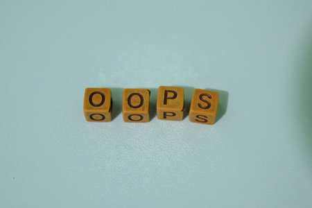 Concept of The wooden Cubes with the word Oopsの写真素材