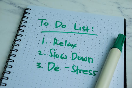 Concept of To Do List write on book with keywords isolated on Wooden Table.の写真素材