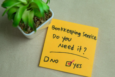 Concept of Bookkeeping Service, Do You Need it? write on sticky notes isolated on Wooden Table.の写真素材