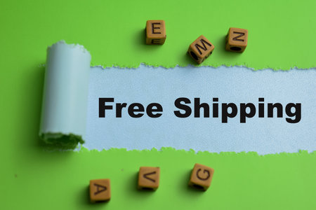 Concept of Free Shipping Text written in torn paper.の写真素材
