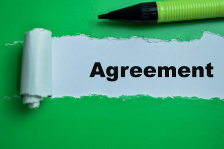 Concept of Agreement Text written in torn paper.の写真素材