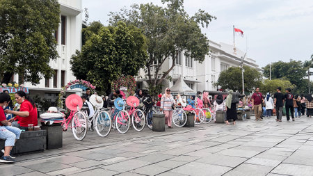 Onthel bicycle tours at Kota Tua area Jakarta city. Jakarta, Indonesia, May 1, 2024