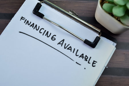 Concept of Financing Available write on paperwork isolated on wooden background.の写真素材