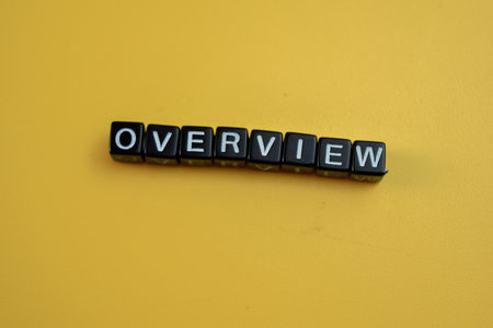 Concept of The wooden Cubes with the word Overview on wooden background.