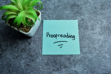 Concept of Proofreading write on sticky notes isolated on Wooden Table.
