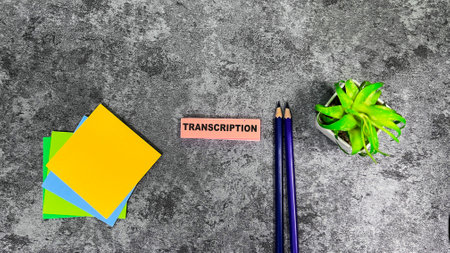 Concept of Transcription write on sticky notes isolated on Wooden Table.の写真素材