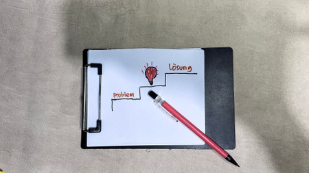 Concept of Problem or Losung write on paperwork isolated on Wooden Table. German Language it means