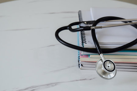 Concept of medical college student with stack of booksの写真素材