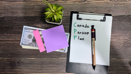 Concept of Canada Pension Plan write on paperwork isolated on Wooden Table.の写真素材