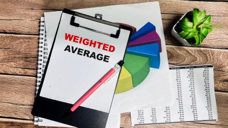 Concept of Weighted Average write on paperwork isolated on Wooden Table.の写真素材