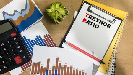 Concept of Treynor Ratio write on paperwork isolated on Wooden Table.の写真素材