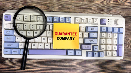 Concept of Guarantee write on sticky notes isolated on Wooden Table.