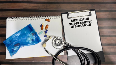 Concept of Medicare Supplement Insurance write on paperwork isolated on Wooden Table.の写真素材
