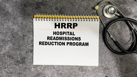 Concept of HRRP - Hospital Readmissions Reduction Program write on book isolated on Wooden Table.
