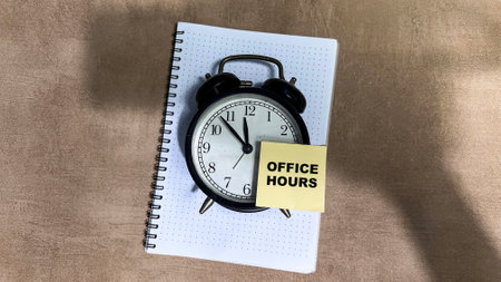 Concept of Office Hours write on sticky notes isolated on Wooden Table.の写真素材