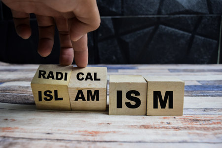 Concept word turns cube and changes the word on wooden blocks on a wooden tableの写真素材