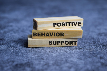 Concept of Positive behavior support Symbol. Wooden block with words Positive behavior supportの写真素材