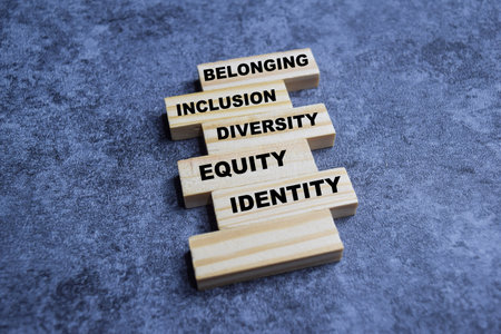 Concept of Belonging, Inclusion, Diversity, Identity Symbol. Wooden block with words Belonging, Inclusion, Diversity, Identityの写真素材