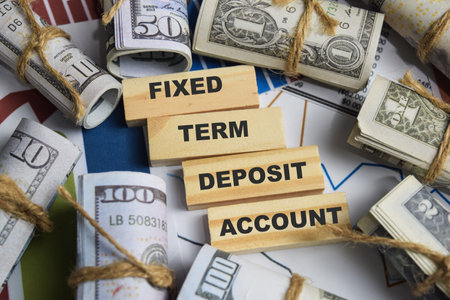 Concept of Fixed term deposit account. Wooden block with words Fixed term deposit accountの写真素材