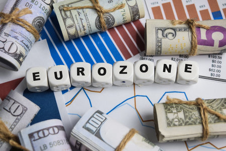 The word Eurozone on stacked wooden cubes on the table. Business and finance conceptの写真素材