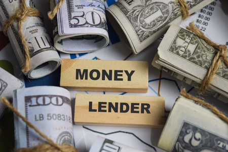 Concept of Money lender. Wooden block with words Money lenderの写真素材