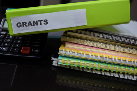 Folders with the label grants. Business management conceptの写真素材