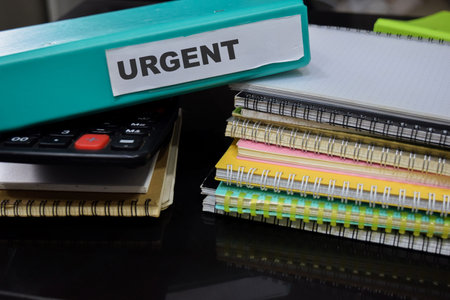 Folders with the label urgent. Business management conceptの写真素材