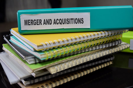 Folders with the label merger and acquisitions. Business management concept